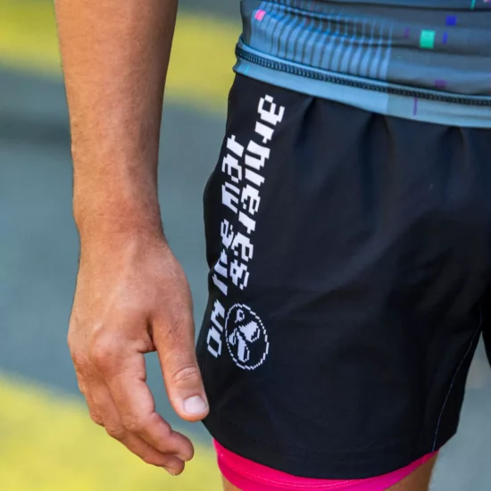 Detail of the logo on the right leg of the grappling shorts, Air Conrad.