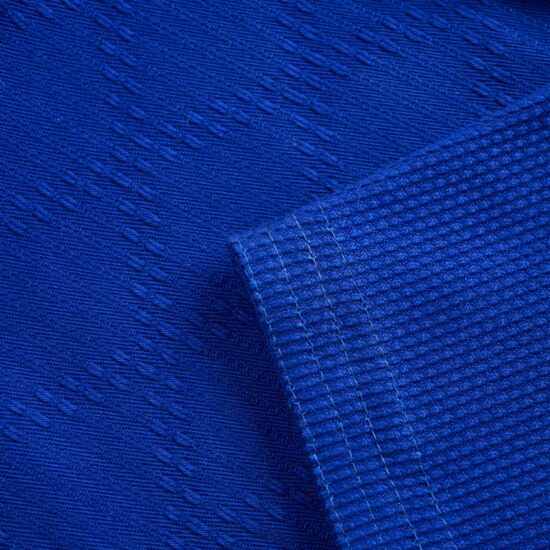 Detail of the both textures on the ATHOM Shohei blue BJJ gi