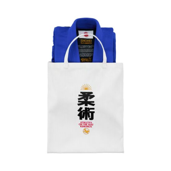 Tote bag with a folded BJJ gi showing above the opening